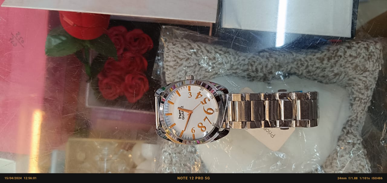 "HMT Quartz Snowfall: White &amp; Silver Watch with Gold Accents and Button Release System"